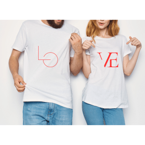 Excited couple wearing custom printed Valentine’s Day T-shirts, celebrating with matching outfits during a romantic getaway in 2025.