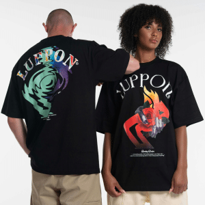 Excited group of people wearing custom printed T-shirts at an outdoor event.